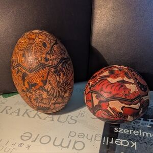Hand carved Peruvian Gourds. One Intact With Seeds To Shake, One With Loose Lid
